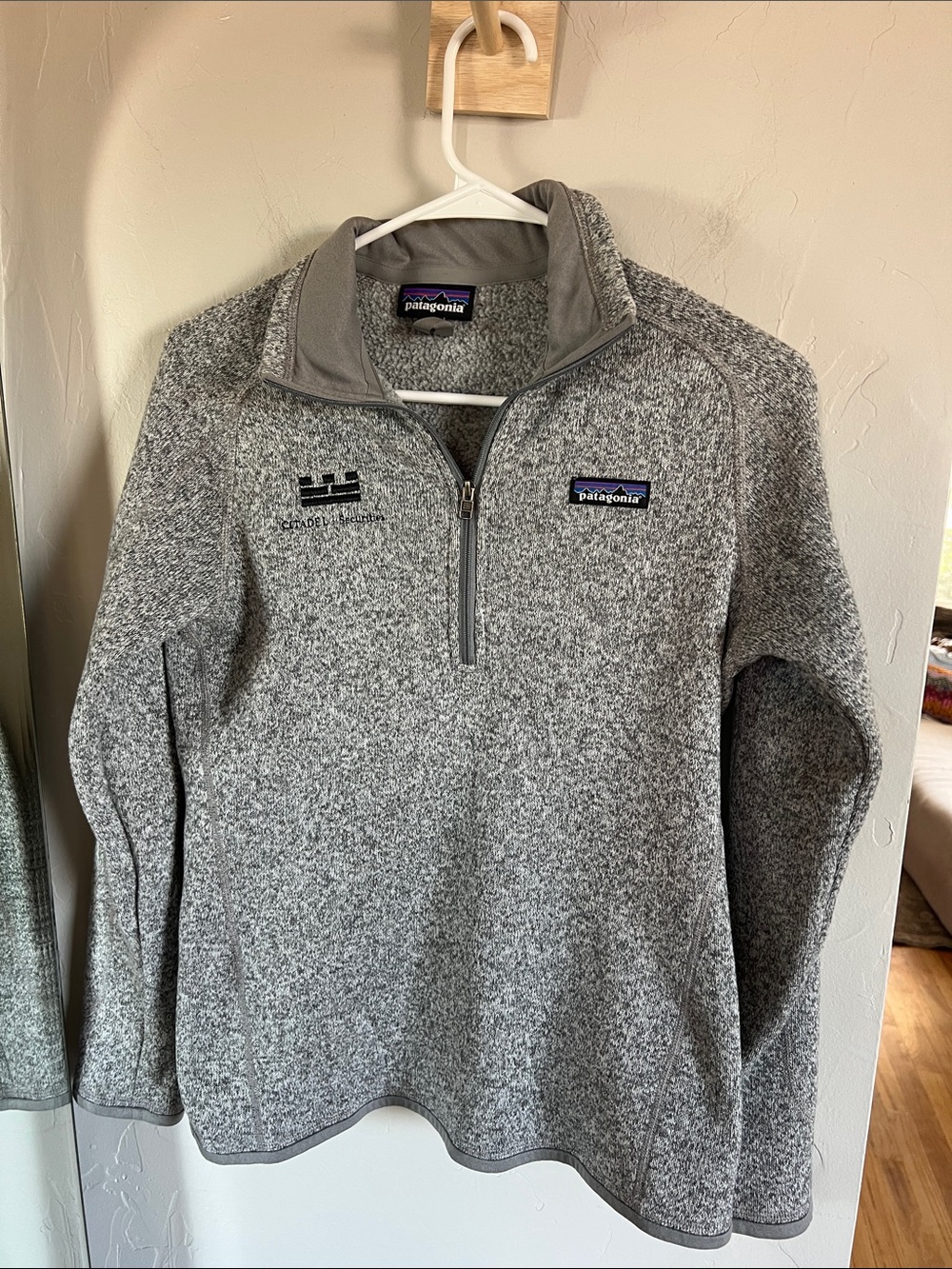 Patagonia women’s  Gray Half-Zip Fleece Pullover. Embroidered company logo
